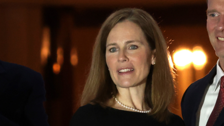 Barrett says justices ‘wear black, not red or blue’ in response to partisan critics in Fox News interview